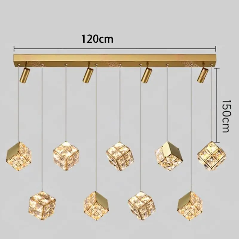 Gold pendant light fixture with crystal-like shades on a gray background, showing dimensions.