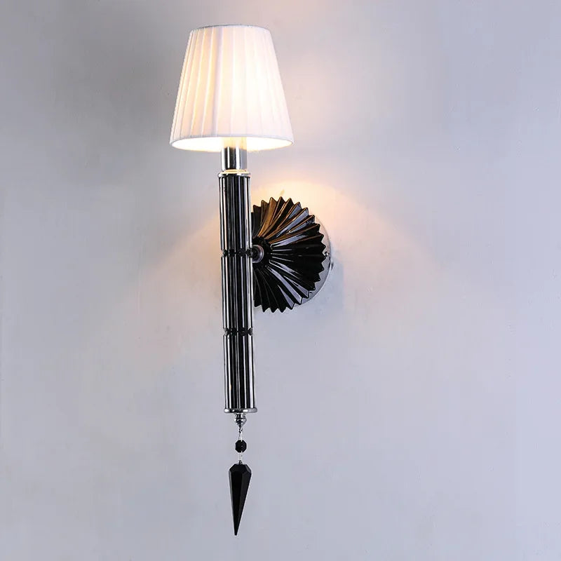 Decorative wall lamp with a unique design on a plain background