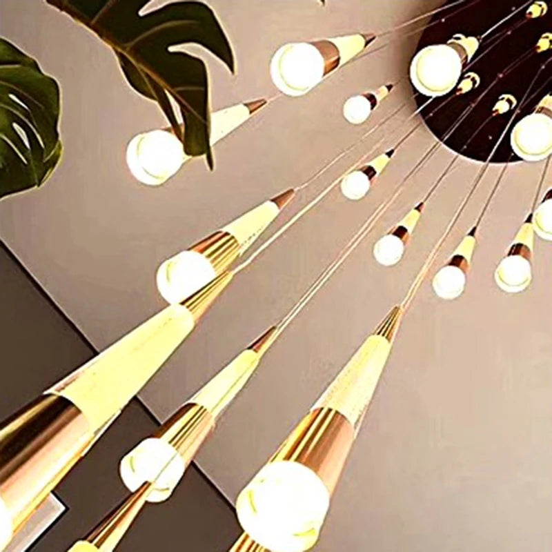 Modern chandelier with gold and white design on a neutral background
