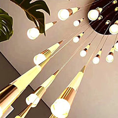 Modern chandelier with gold and white design on a neutral background