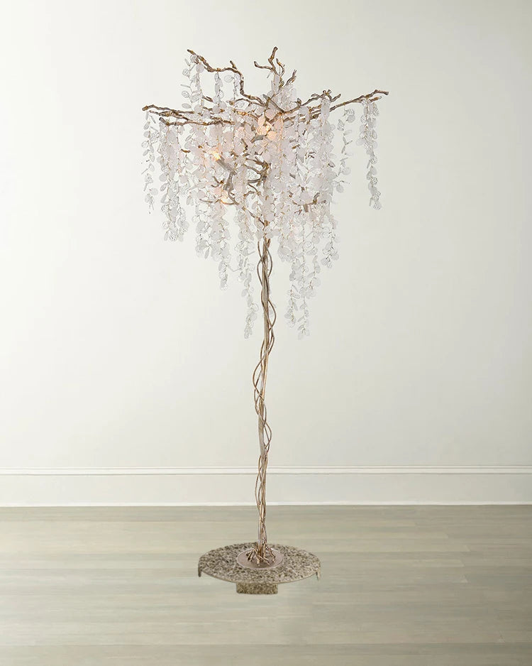 Decorative floor lamp with crystal accents on a plain background