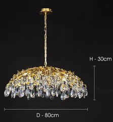 Gold chandelier with crystal details on a black background