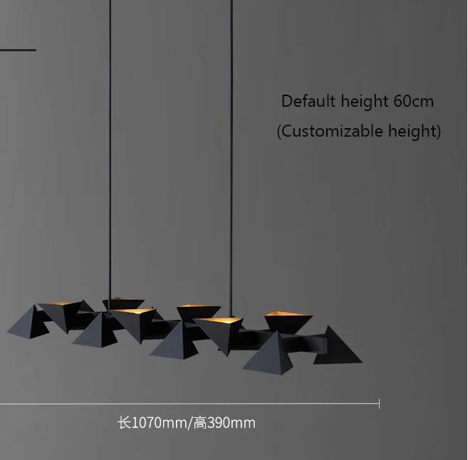 Modern black pendant light with geometric design on a gray background