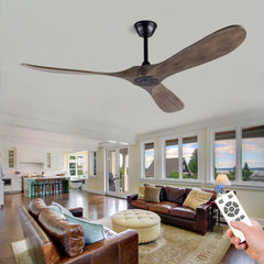Dark brown wooden three-blade ceiling fan with a black mount, shown in a living room with leather sofas and a remote control in hand.