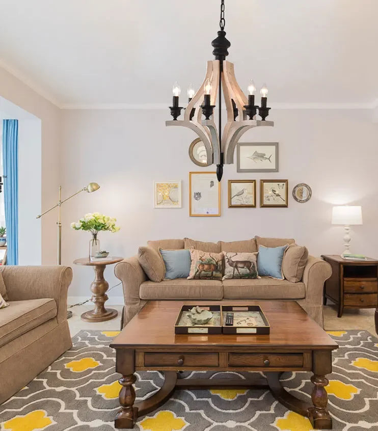 Living room with beige sofa, wooden coffee table, and decorative elements.