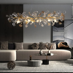 A different view of the gold leaf crystal chandelier in a dining room setting.