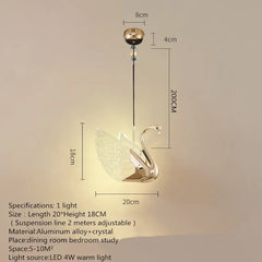 Gold swan-shaped pendant light with dimensions and specifications on a beige background