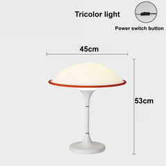 Table lamp with tricolor light feature and dimensions on a white background