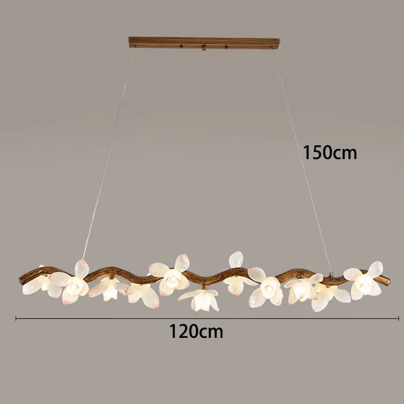 Chandelier with floral design and measurement details on a gray background