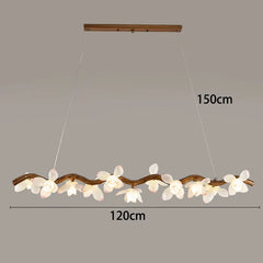 Chandelier with floral design and measurement details on a gray background