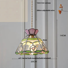 Stained glass pendant light with dimensions and bulb information on a neutral background