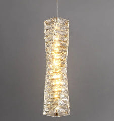 Crystal pendant light fixture on a gray background