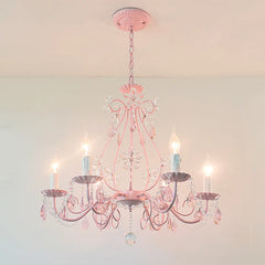 Pink semi-flush mount chandelier with crystal flower accents and hanging crystal droplets, illuminated.