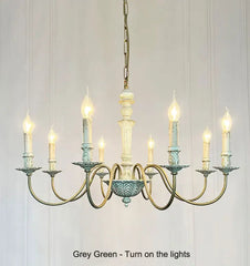 Chandelier with multiple lights on a plain background