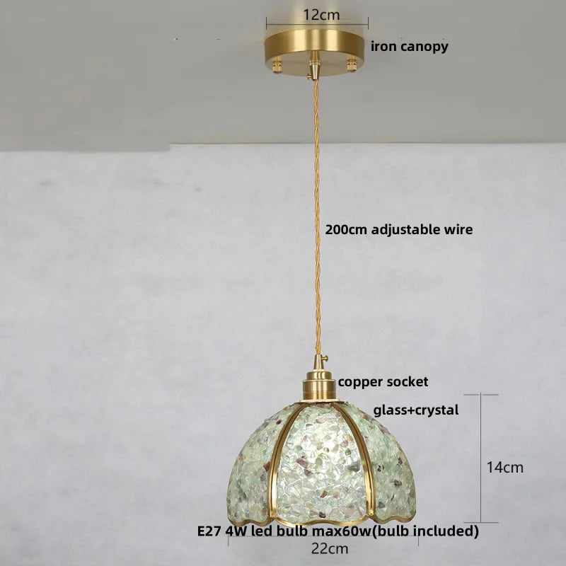 Pendant light with measurements on a plain background
