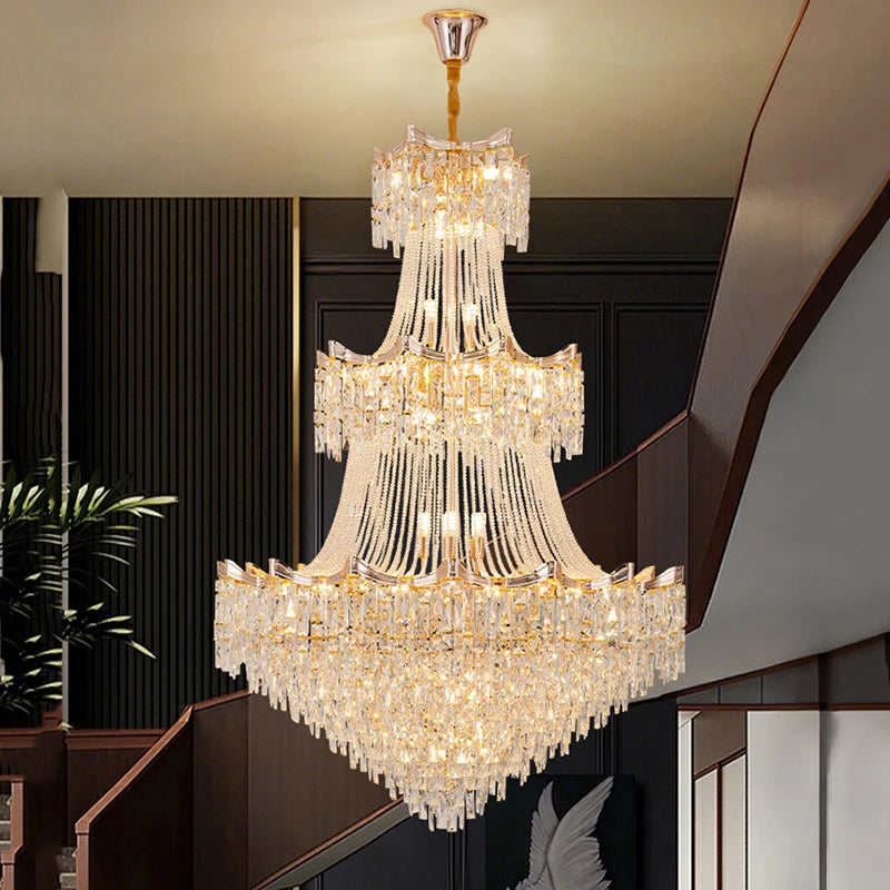Luxurious crystal chandelier hanging in a room with dark paneling and a plant.
