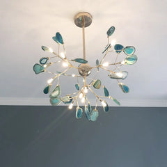 Gold finished sputnik chandelier with blue and green agate slices hanging from thin branches