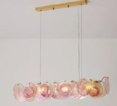 Chandelier with pink glass shades on a white background
