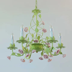 Close-up of the green floral ceramic chandelier detailing the rose and leaf elements.