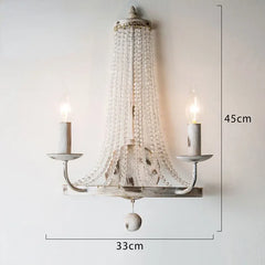 Chandelier with dimensions labeled on a plain background