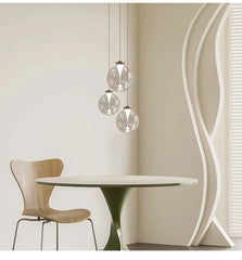 Glass Globe Pendant Light with Brushed Gold Metal Frame Accents