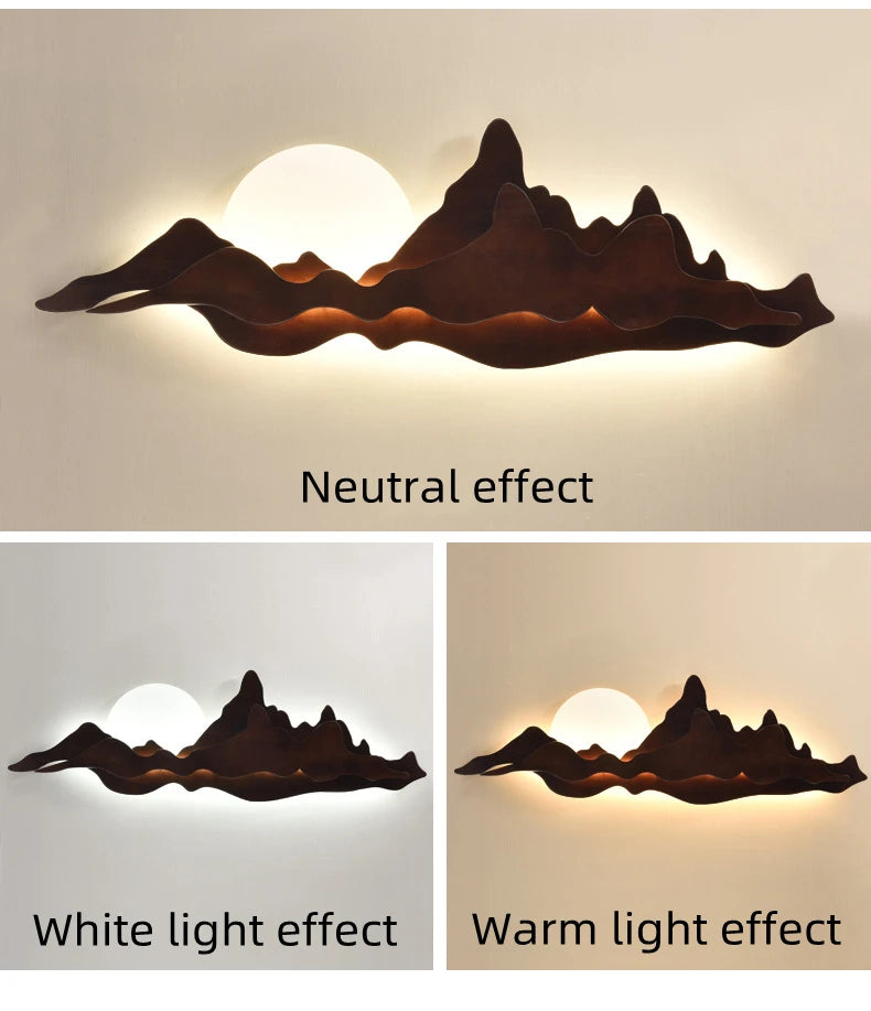 Mountain-shaped wall light with neutral, white, and warm light effects on a beige background.
