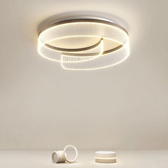 Modern double ring semi-flush ceiling light with integrated LED illumination.