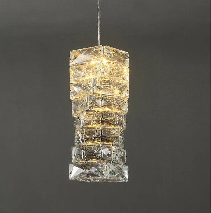 Crystal pendant light fixture on a dark background