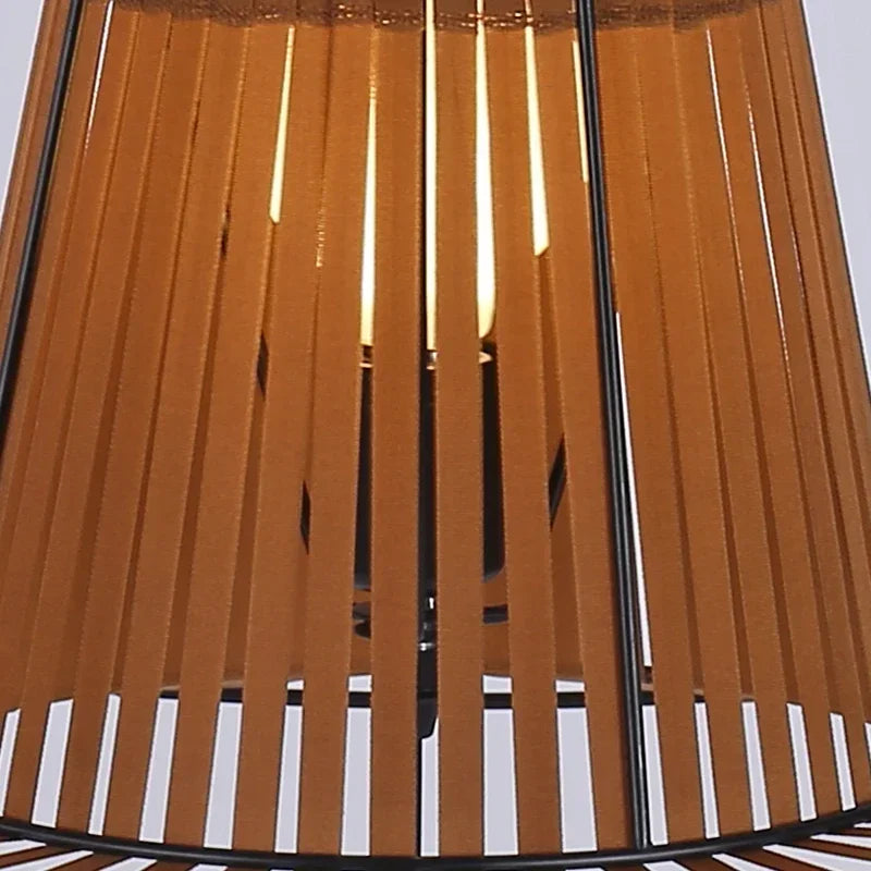 Close-up of a brown and black striped chair with a white background
