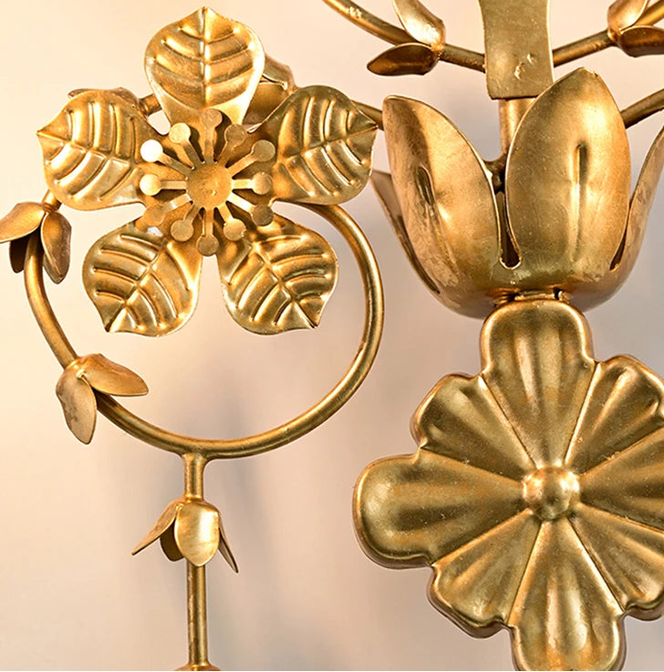 Gold floral decorative item with on a beige background