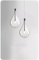 Teardrop Glass Pendant Light with Minimalist Metal Accent