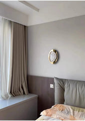 Gold Oval Frame Textured Resin Egg Sconce Wall Light with Warm Glow