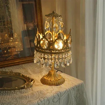 Decorative lamp with crystal accents on a tableclothed table