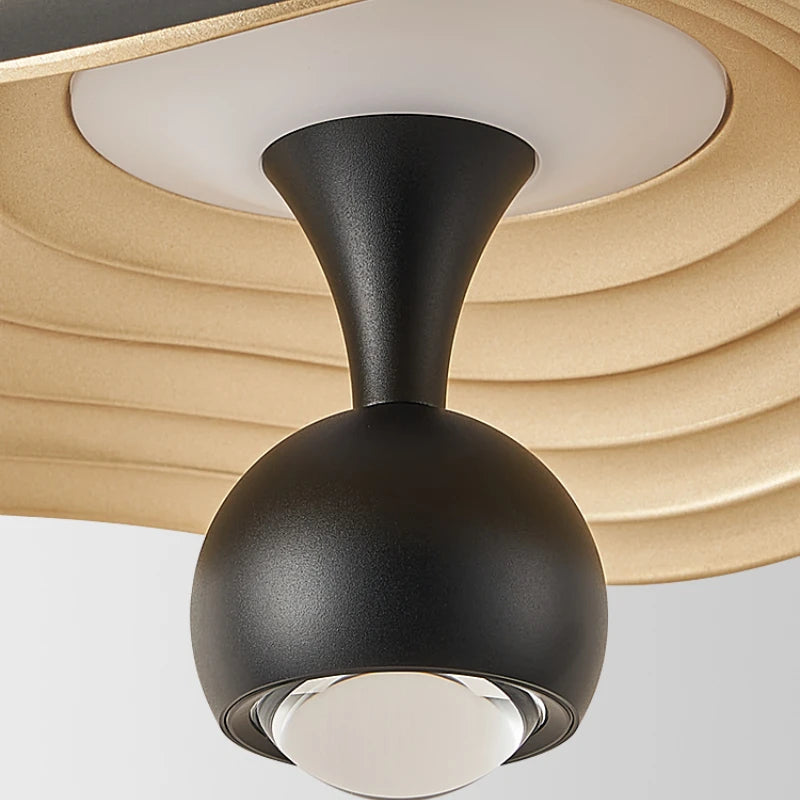 Ceiling fan with black light fixture on a neutral background