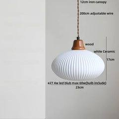 White ceramic pendant light with wooden canopy on a gray background