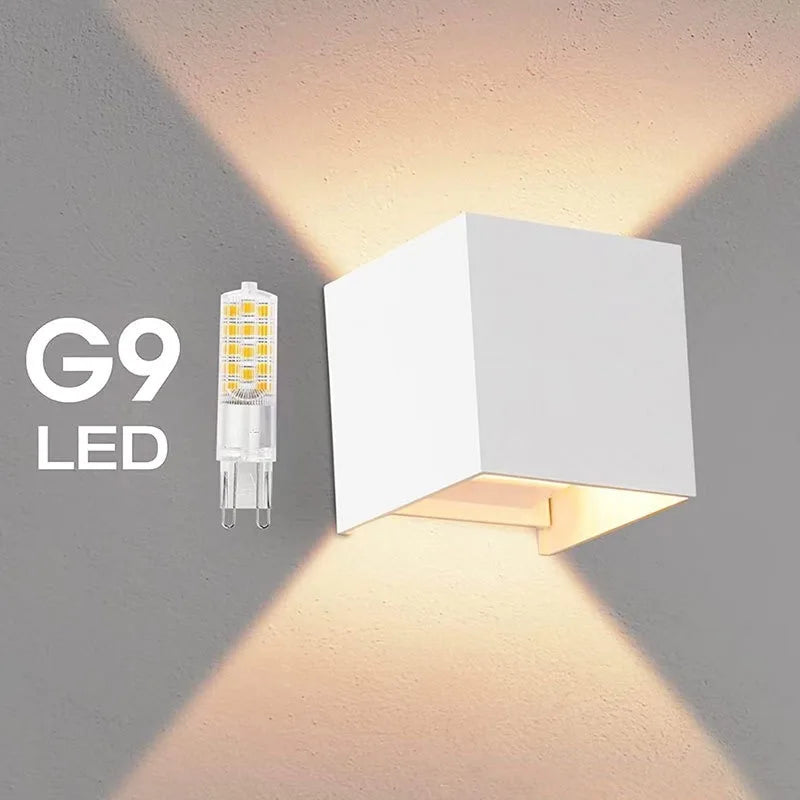 G9 LED light bulb and a square wall light fixture on a gray background