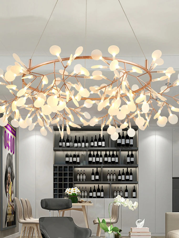Modern chandelier in a room with wine bottles on shelves