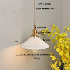 Pendant light with labeled parts and a yellow flower arrangement on a gray background