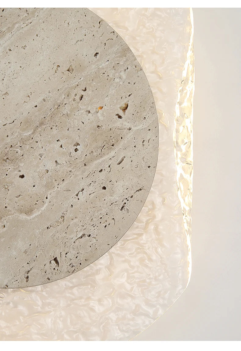 Close-up of a textured stone surface with a circular cutout