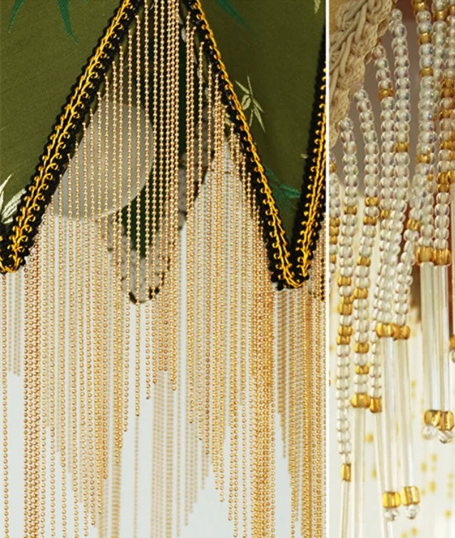 Decorative beaded curtains with gold and black accents.