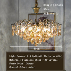 Chandelier with crystal accents and adjustable hanging chain on a neutral background