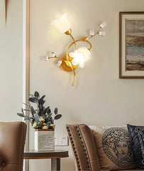 Modern wall lamp in a living room setting with decor elements.