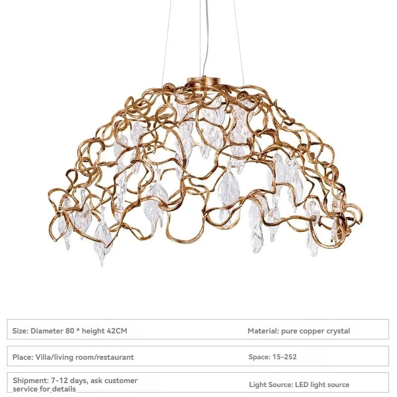 Gold chandelier with crystal accents on a white background
