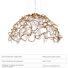 Gold chandelier with crystal accents on a white background