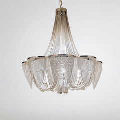 Chandelier with a beaded design on a white background