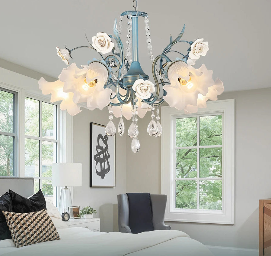 Decorative chandelier with floral design in a bedroom setting