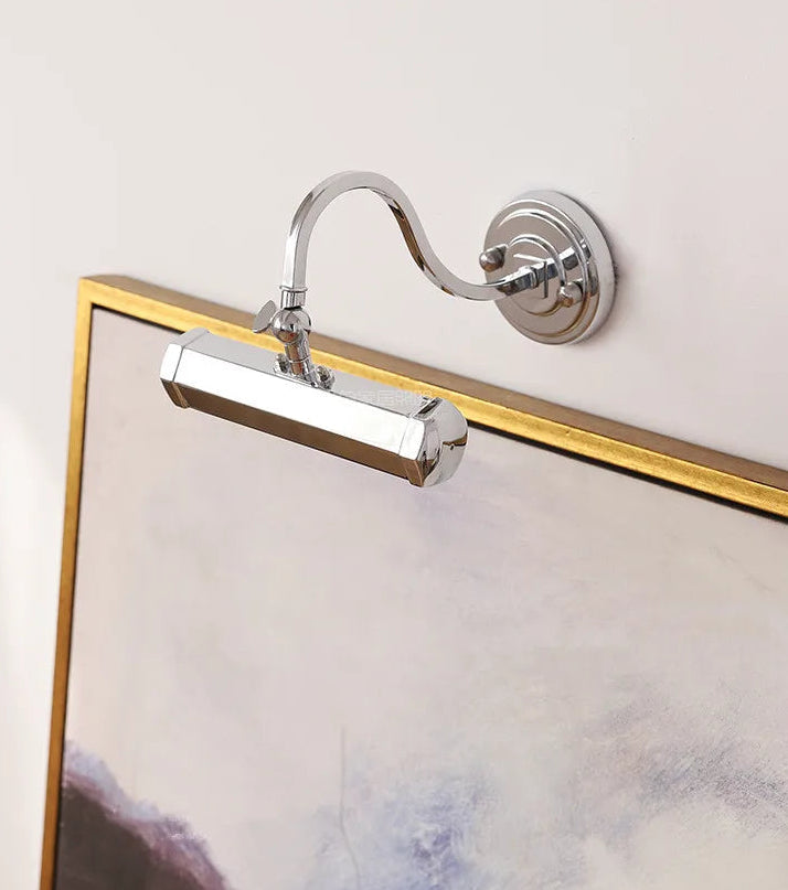 Wall-mounted lamp with flexible arm on a light gray background