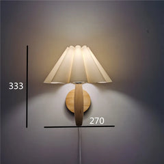 Wall-mounted lamp with dimensions indicated on a dark background