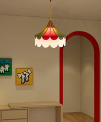 Colorful ceiling lamp in a room with a red arch and wall art.