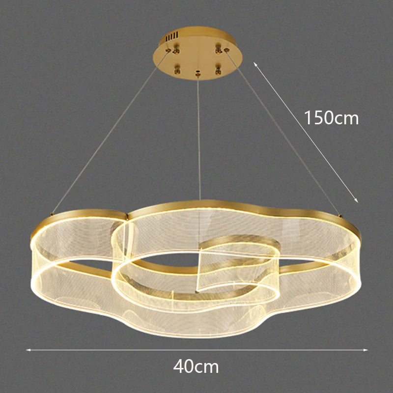 Gold pendant light with dimensions on a dark background